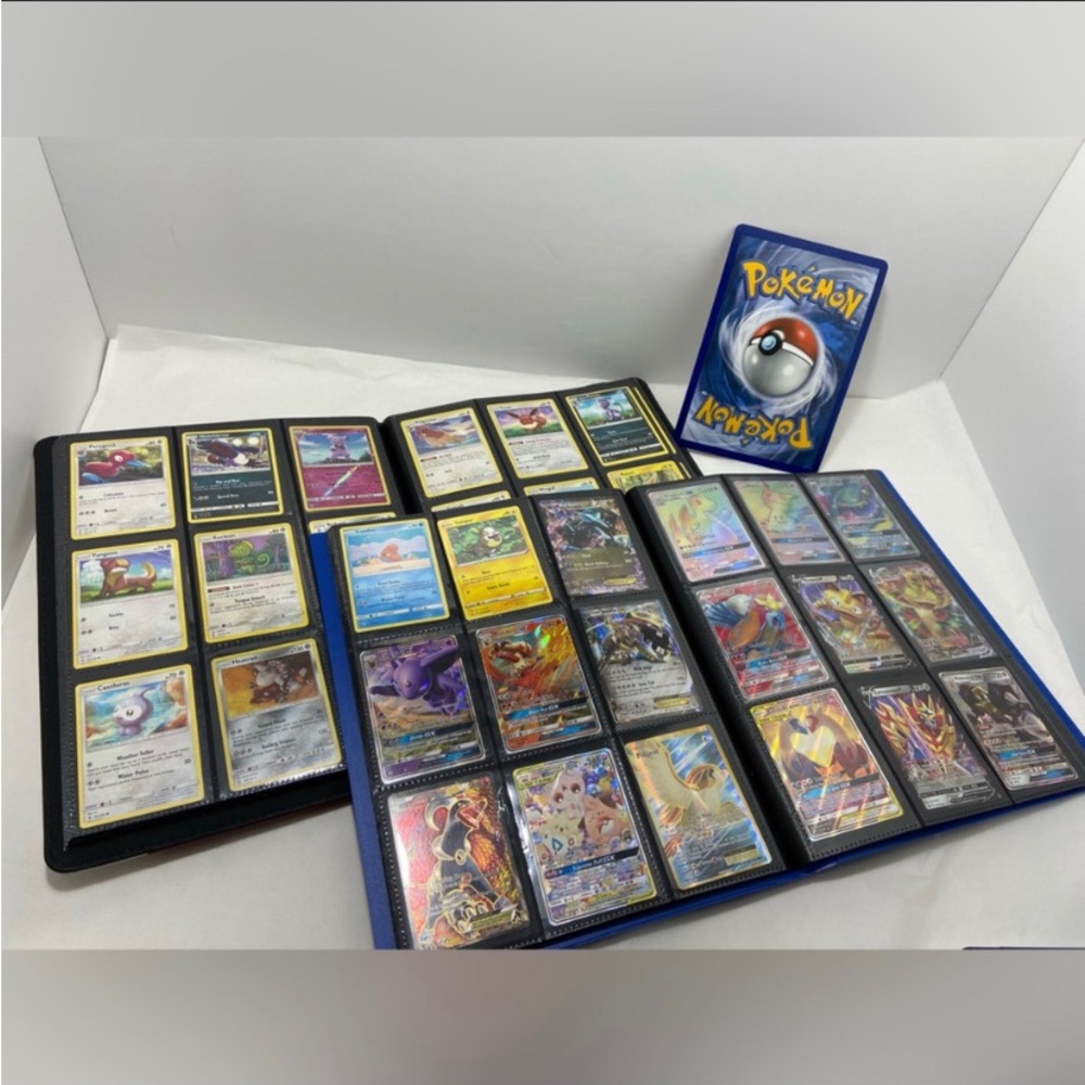 478 Pokémon cards with two binders